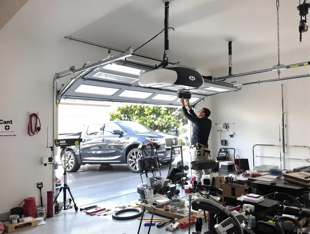 Fullerton Garage Door Repair specialist installing smart garage door opener system in Fullerton home