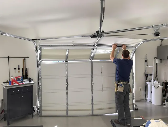 Fullerton Garage Door Repair specialist performing precise section replacement on Fullerton garage door