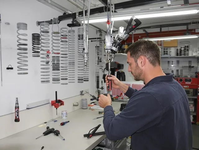 Fullerton Garage Door Repair safety certified technician performing precision spring replacement in Fullerton